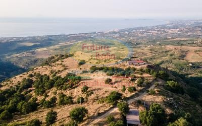 Rif. 490 | Basicò | Terreno agricolo panoramico con ruderi annessi